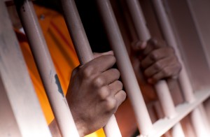 Man in prison cell